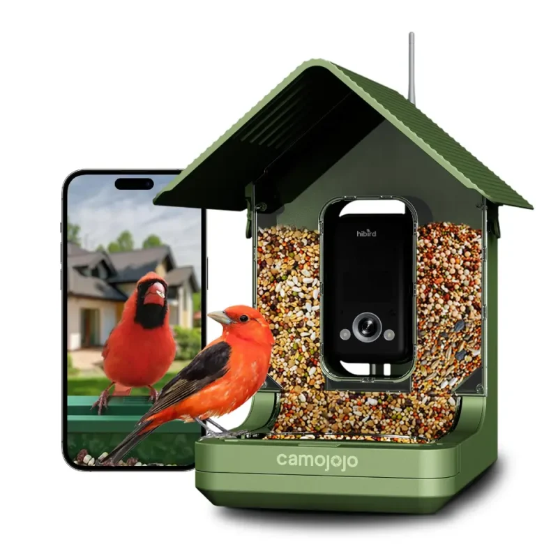 A Green 4K HD bird feeder with a camera, filled with seeds, features a cardinal perched on top, ready to eat