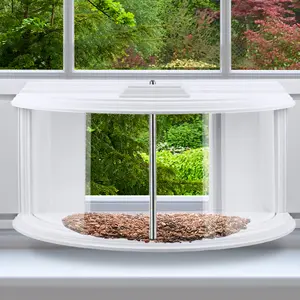 Window Sill Bird Feeder - 180° Clear View, Durable & Elegant 4 Windowsill bird feeder filled with birdseed, perfect for indoor bird watching and home decor