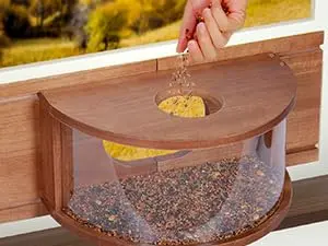 180° Clear View Wooden Window Bird Feeder - Fits 23-36" Windows 5 Wooden window bird feeder with a top opening for easy filling and refilling of bird seed
