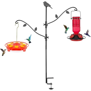 Deck bird feeder pole with multiple hooks for hanging various bird feeders, attached to a deck railing