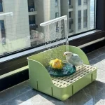 indoor bird bath for parakeets on windowsill
